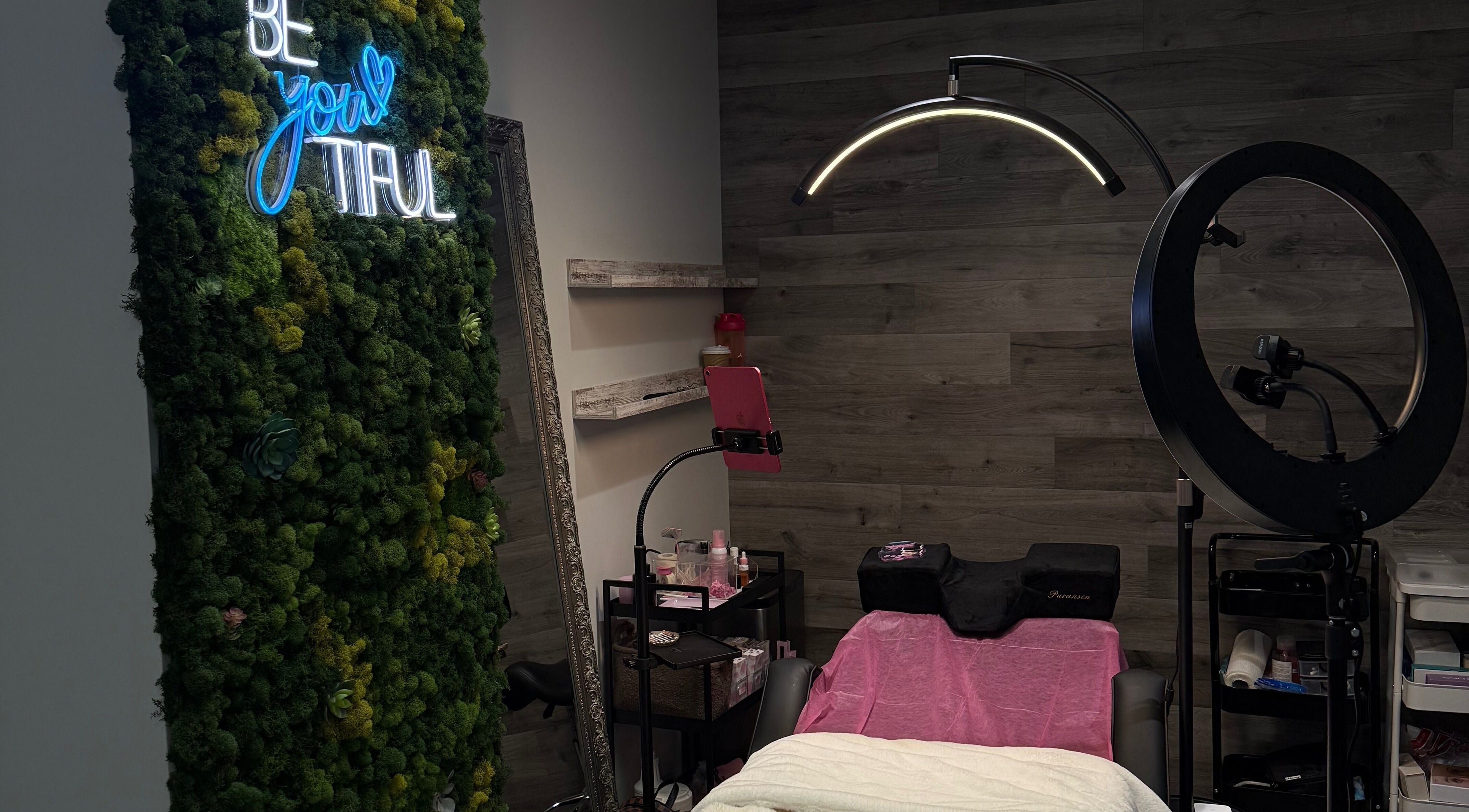 Serene beauty room at Lash Shawty West Broadway, Vancouver, British Columbia, CA with lush greenery decor.