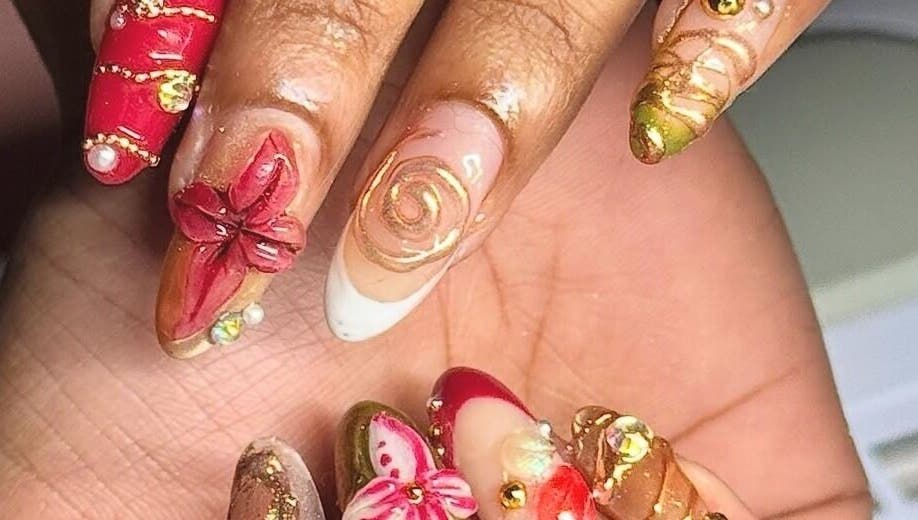 Intricate nail art with floral and glitter designs at BeaNailTech, Vancouver, British Columbia, CA.
