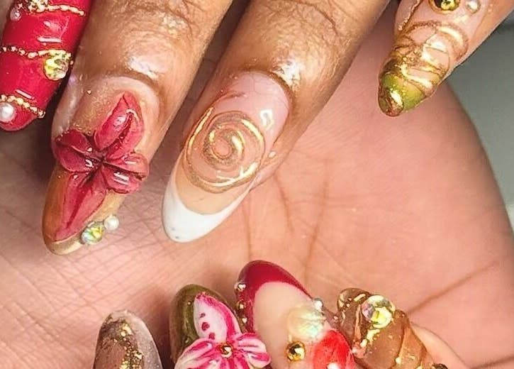 Intricate nail art with floral and glitter designs at BeaNailTech, Vancouver, British Columbia, CA.