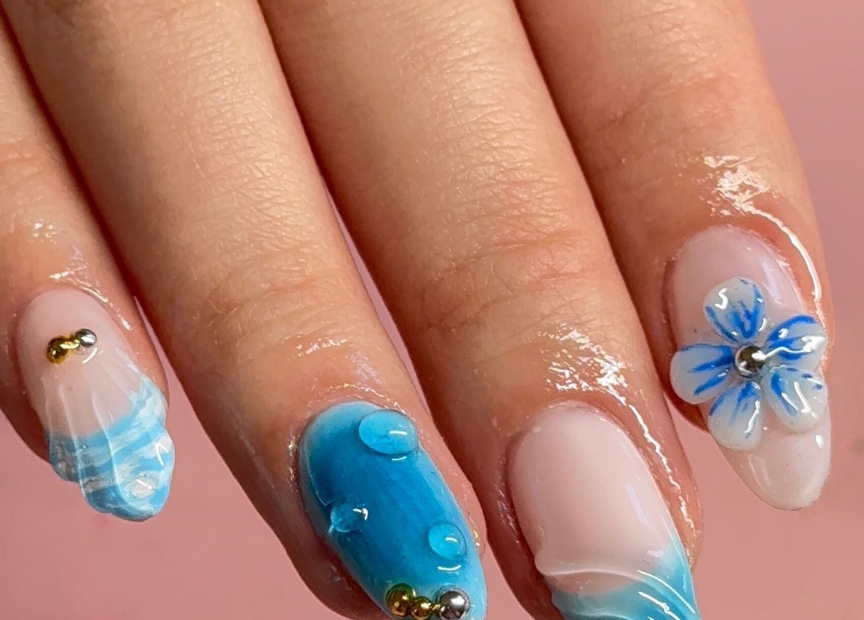 Elegant blue floral nail art at BeaNailTech in Vancouver, British Columbia, CA. Perfect for any occasion.