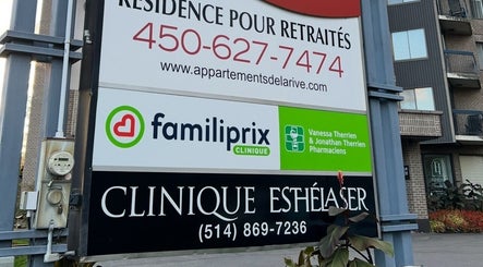Enseigne de Clinique ESTHÉLASER à Laval, Québec, CA, illustrant l'accès principal.