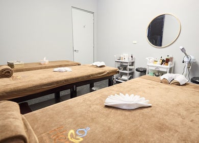 Tranquil massage room at Healix Spa & Massage Therapy, St Leonards, New South Wales, AU with two massage tables.