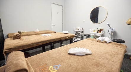 Tranquil massage room at Healix Spa & Massage Therapy, St Leonards, New South Wales, AU with two massage tables.