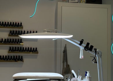 Sofiel.Nails salon in Stourbridge, England, GB features a modern nail station with polish display.