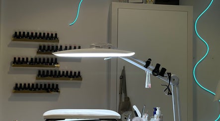 Sofiel.Nails salon in Stourbridge, England, GB features a modern nail station with polish display.
