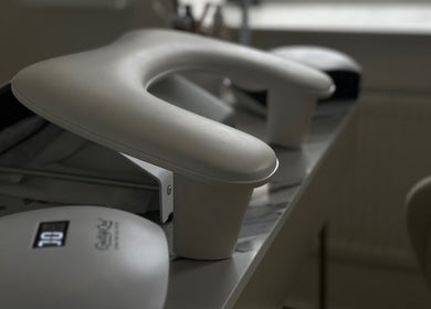 Modern nail station at Sofiel.Nails, Stourbridge, England, GB, featuring sleek armrests and tools.