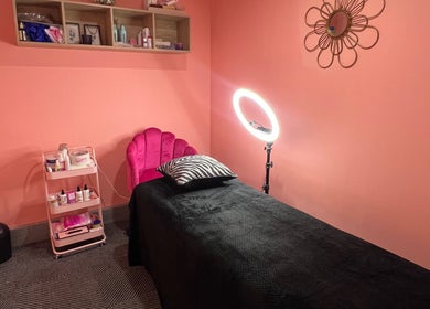 Peaches Beauty Bar Midrand treatment room with peach walls in Midrand, Gauteng, ZA.