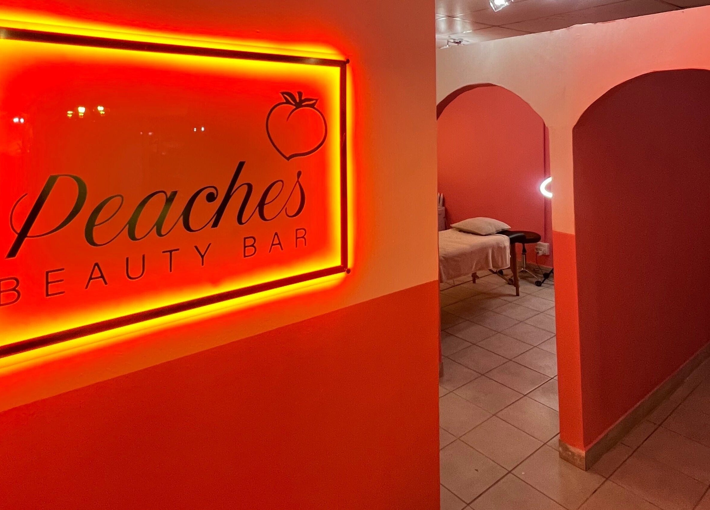 Warm glow at Peaches Beauty Bar, Edenvale, Gauteng, ZA; cozy treatment room in view.