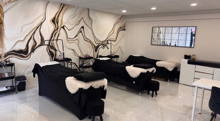 Modern spa room at Beautybyanna Jane, Leyland, England, GB with stylish decor and treatment beds.