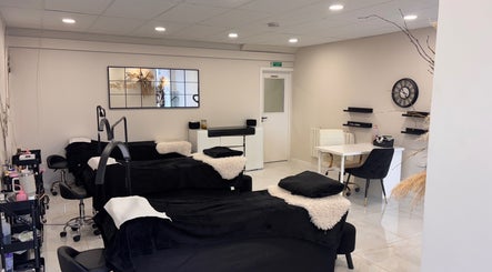Beautybyanna Jane's tranquil spa room in Leyland, England, GB, featuring cozy black treatment beds.