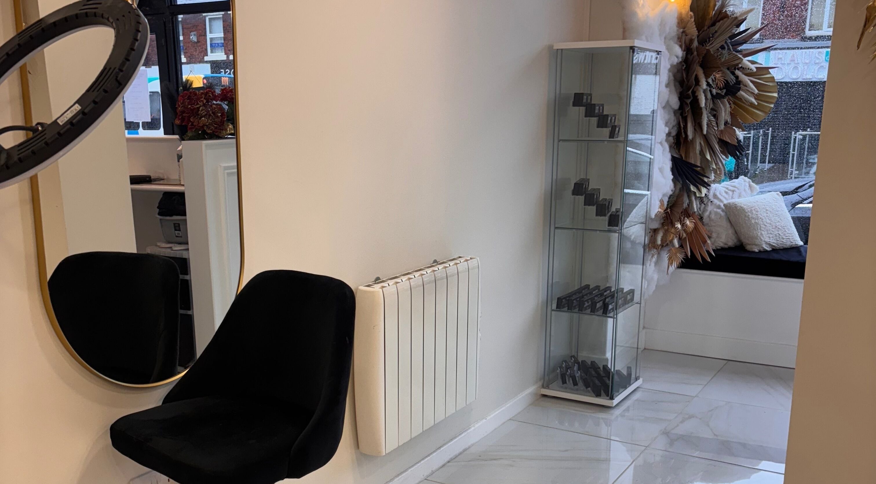 Chic beauty corner at Beautybyanna Jane, showcasing a sleek black chair and stylish decor in Leyland, England, GB.