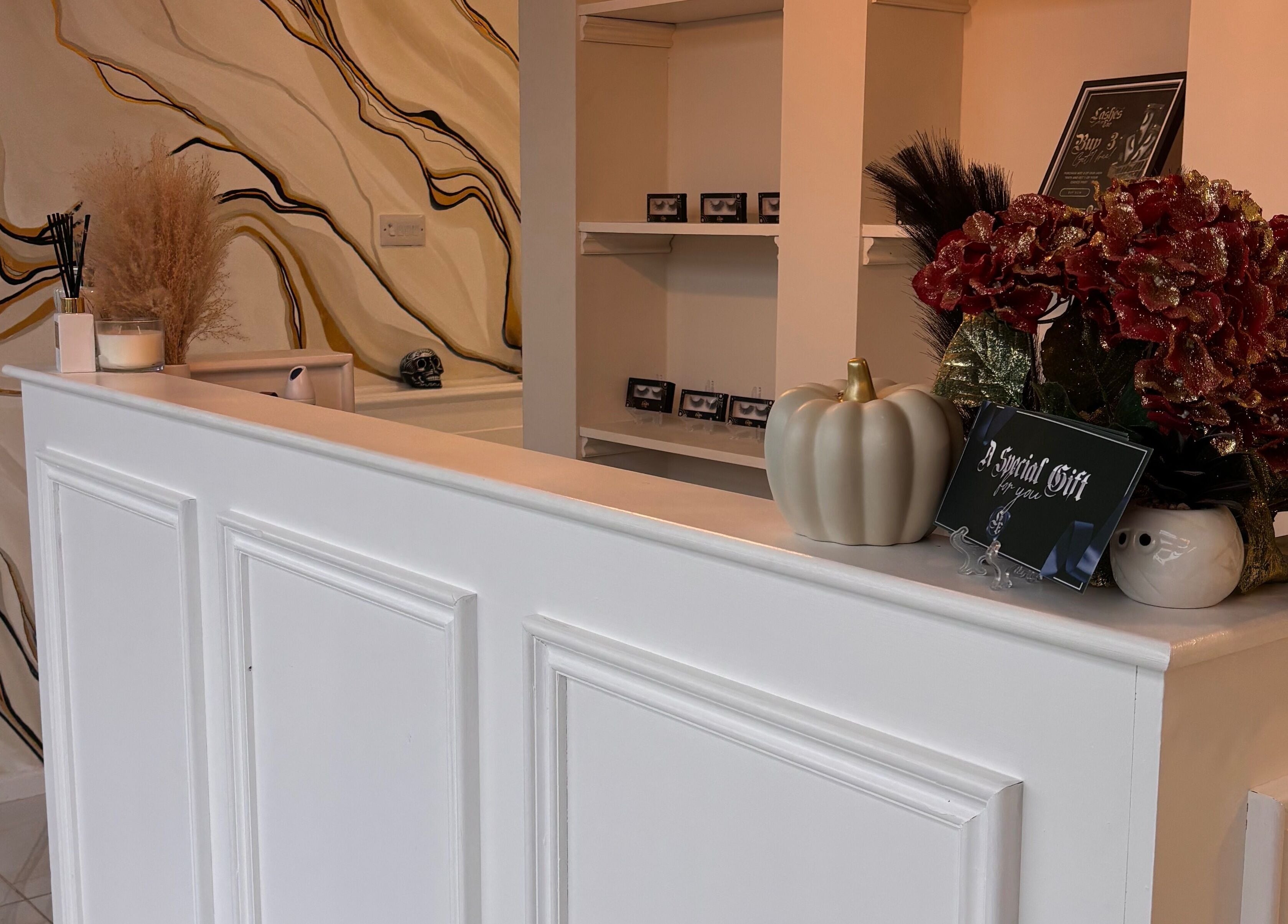 Reception desk at Beautybyanna Jane in Leyland, England with stylish decor and welcoming setup.