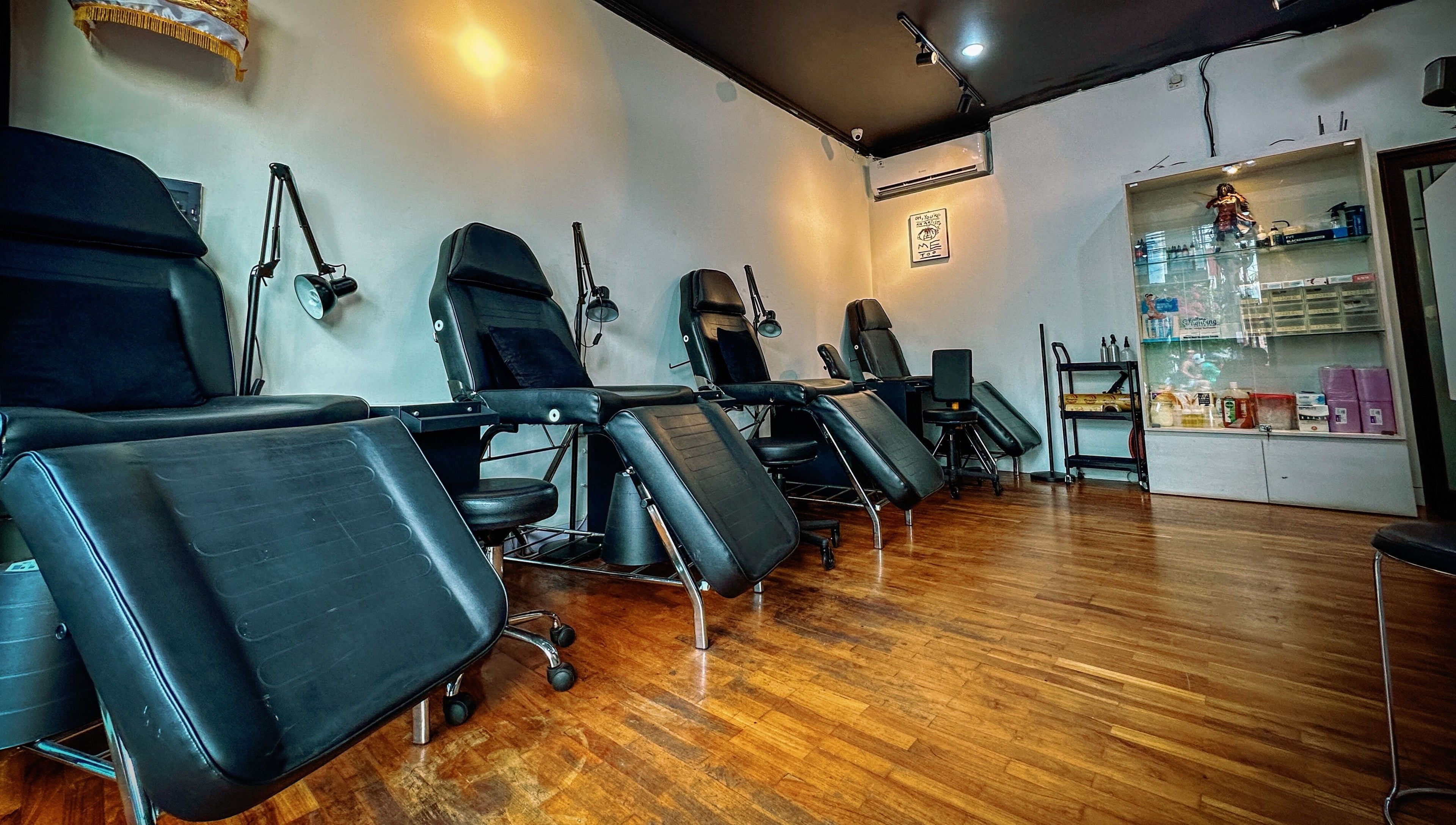 Modern tattoo chairs in Timeless Ink studio, Bali, Bali, ID, showcasing a sleek and inviting atmosphere.