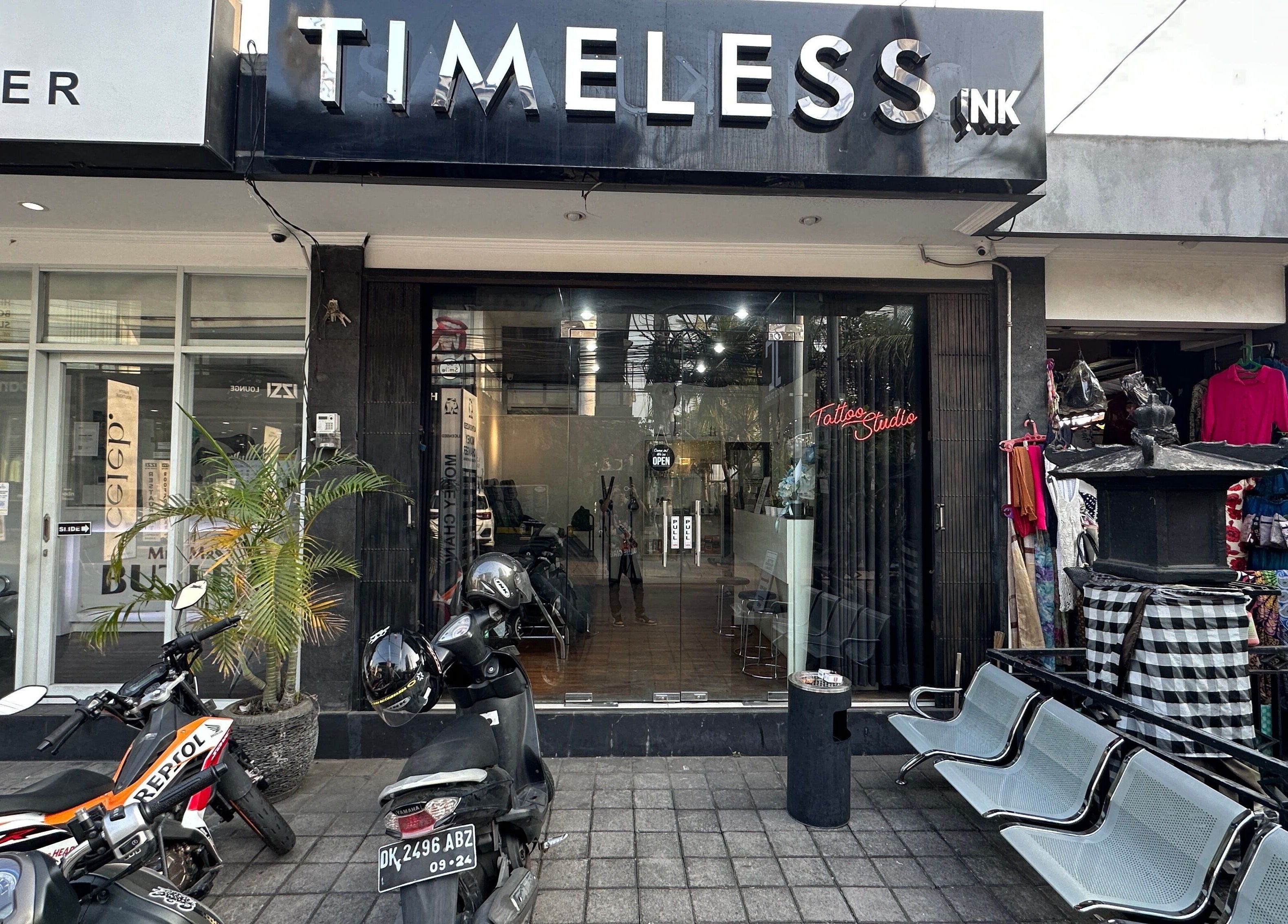 Entrance of Timeless Ink tattoo studio in Bali, Bali, ID, showcasing a modern storefront design.