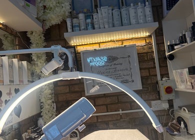 Skincare products and equipment at Monica’s Beauty Lounge in London, England, GB highlight a serene atmosphere.