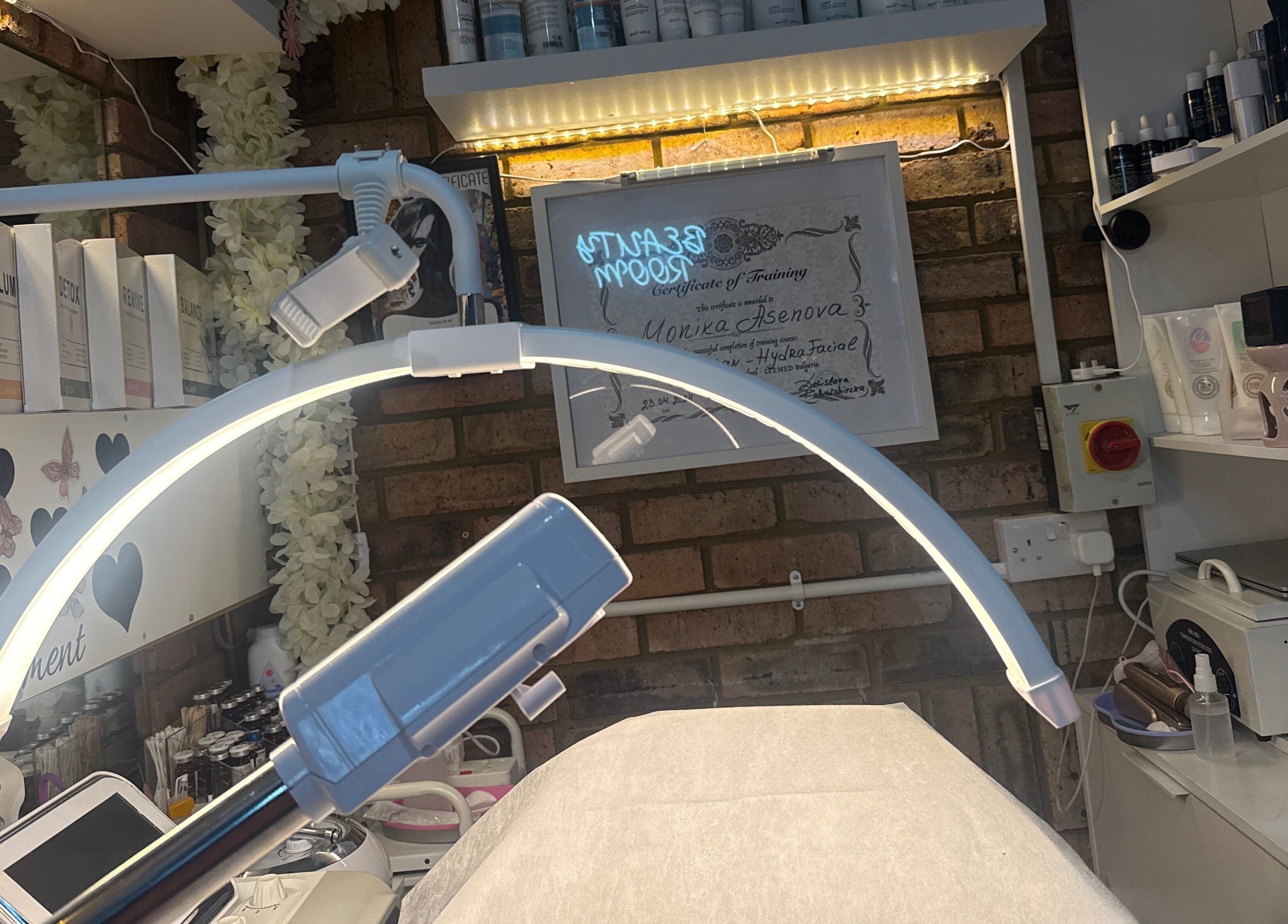 Monica's beauty treatment room at Damla & Sue Hair and Beauty in London, England, GB, featuring various skincare products.