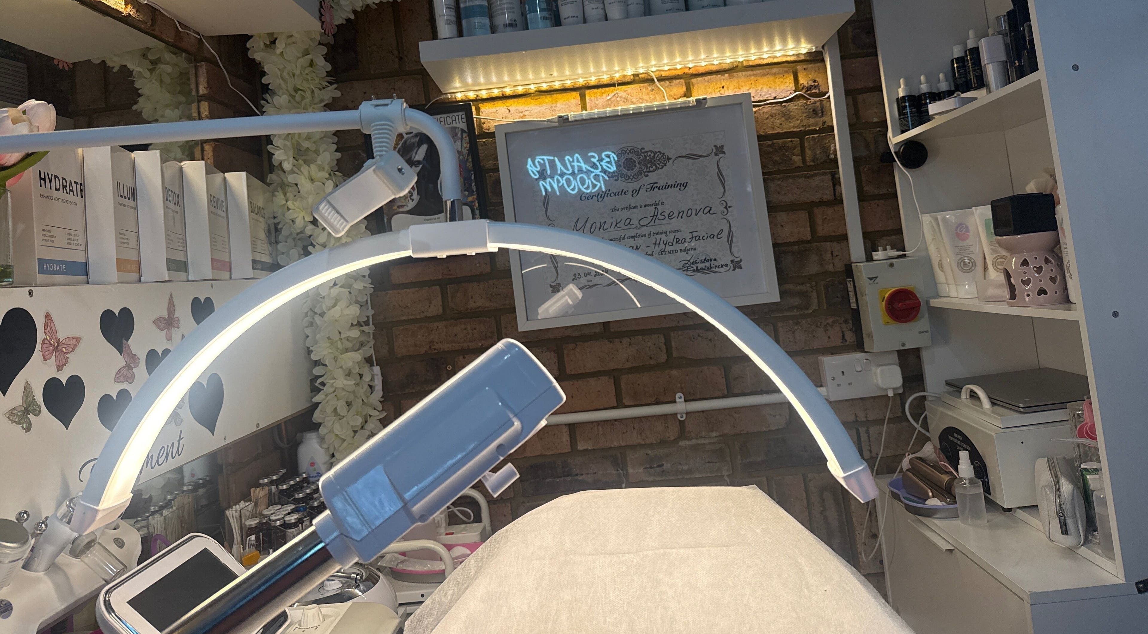 Monica's beauty treatment room at Damla & Sue Hair and Beauty in London, England, GB, featuring various skincare products.