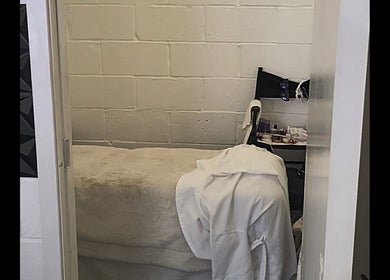 Calm treatment room at Purebrowslashbar, Sittingbourne, England, GB, showcasing a comfortable bed and equipment.