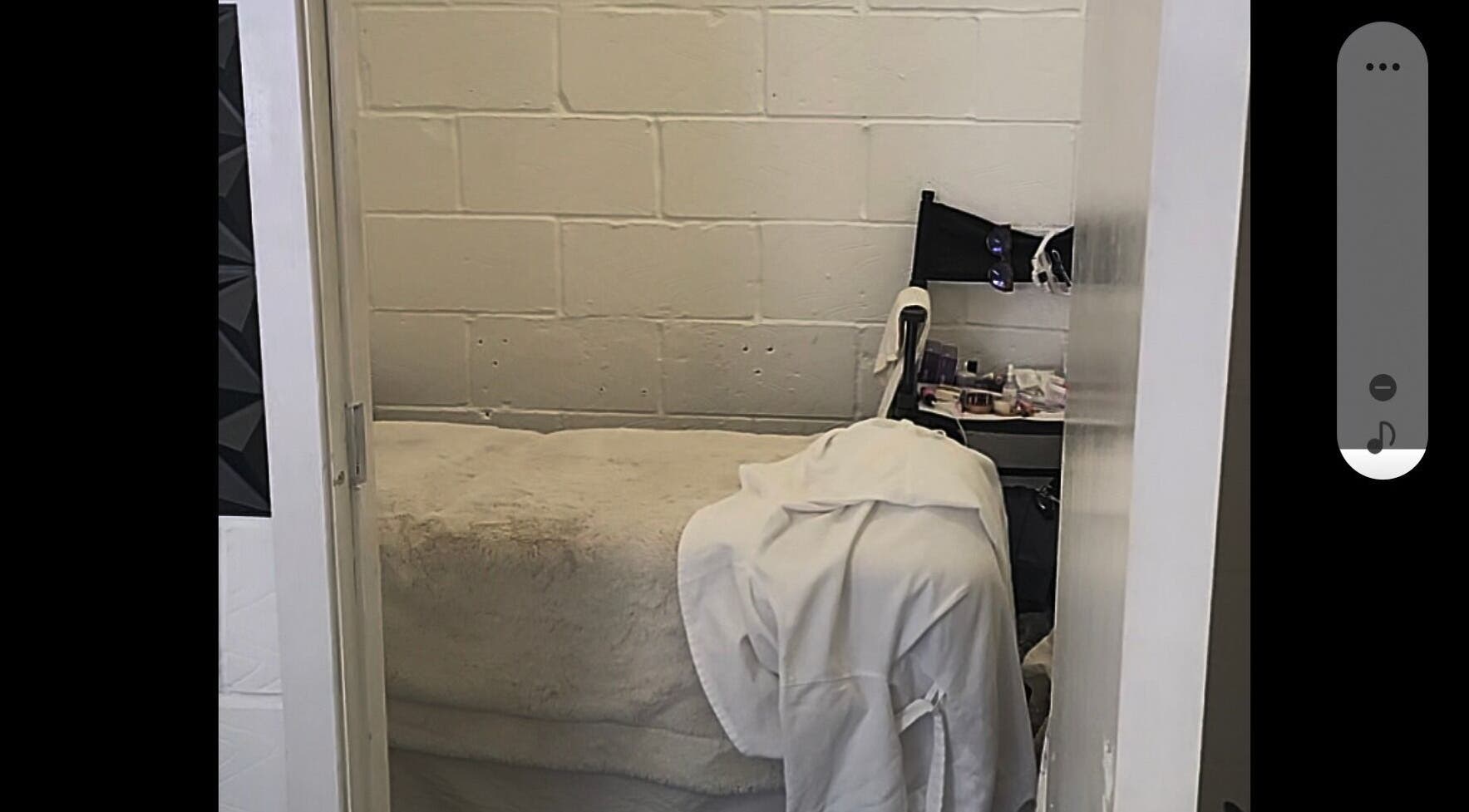 Calm treatment room at Purebrowslashbar, Sittingbourne, England, GB, showcasing a comfortable bed and equipment.