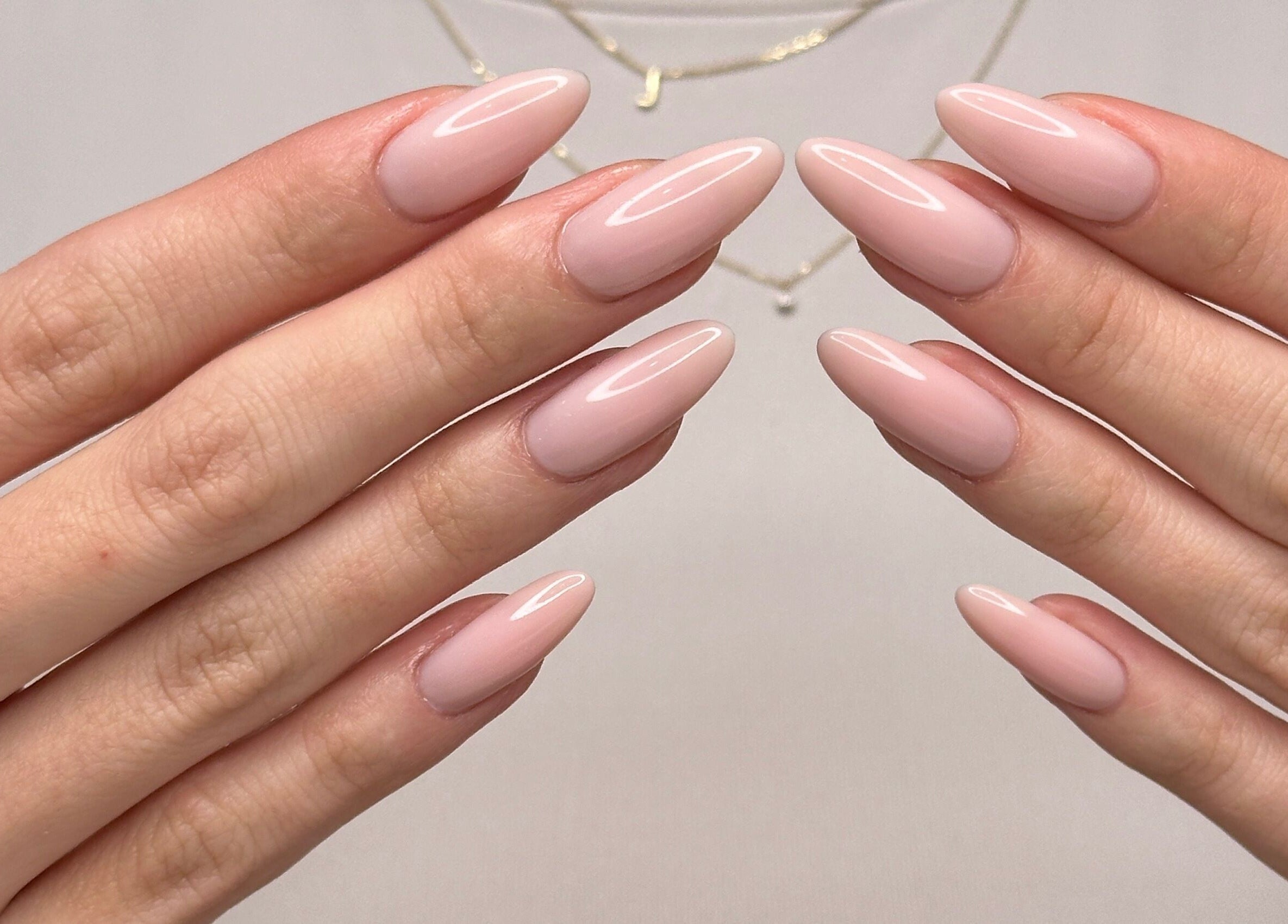 Stylish pink nails beautifully manicured at Studio April in Melbourne, Victoria, AU, enhancing hand aesthetics.