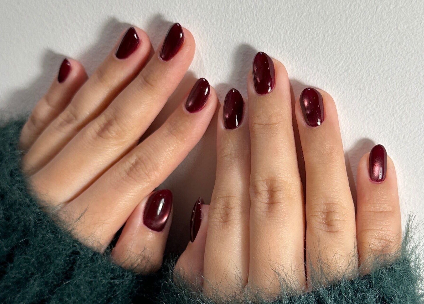 Elegant burgundy manicure at Studio April, Melbourne, Victoria, AU. Perfect for a stylish, sophisticated look.