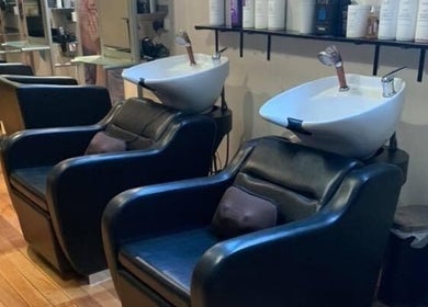 Modern shampoo chairs at The Hair Lounge (The Salon on Princes), Dunedin, Otago Region, NZ, offering premium comfort.