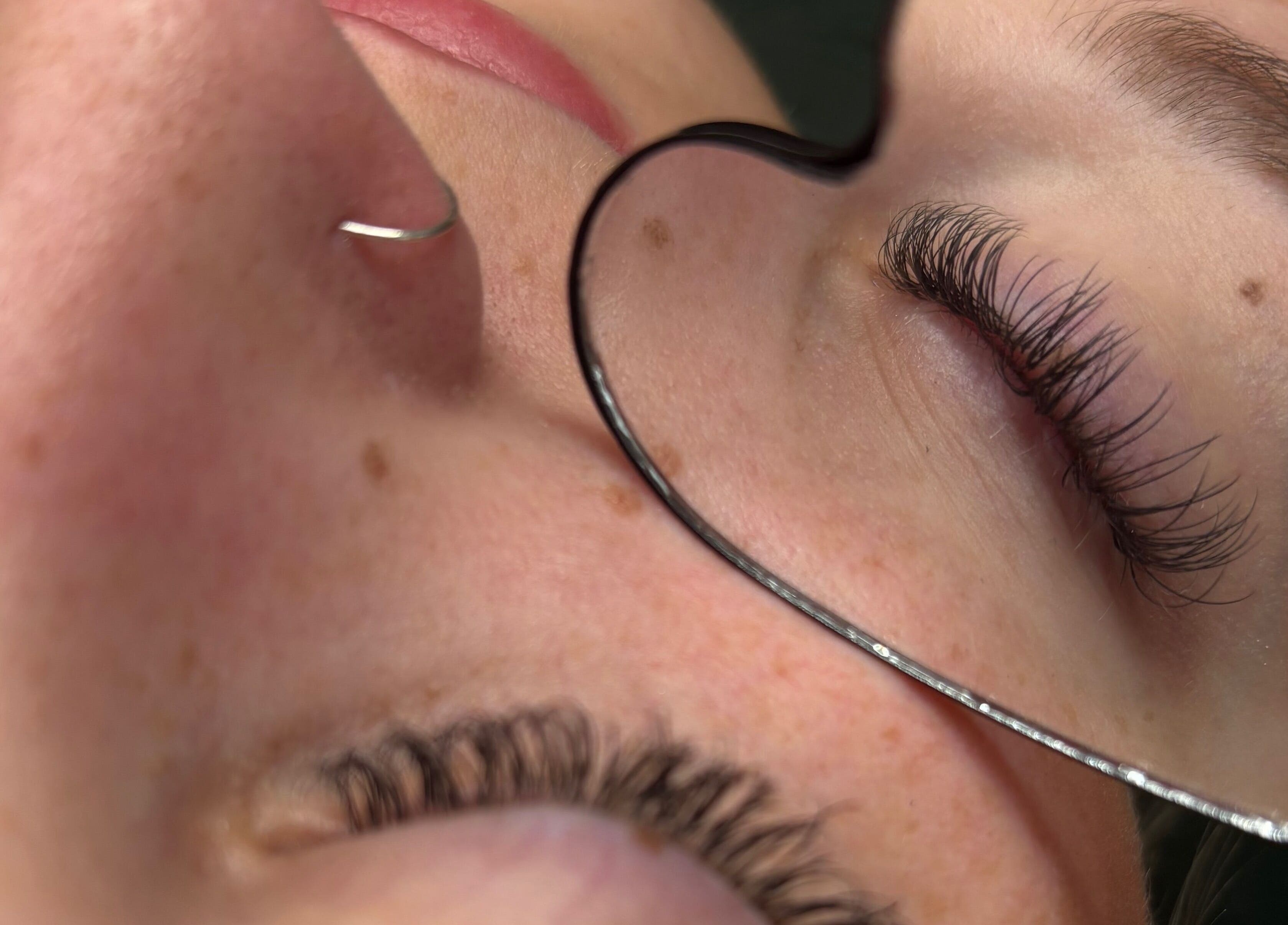 Close-up of eyelashes in a mirror at lishas_lashes, Londonderry, Northern Ireland, GB.