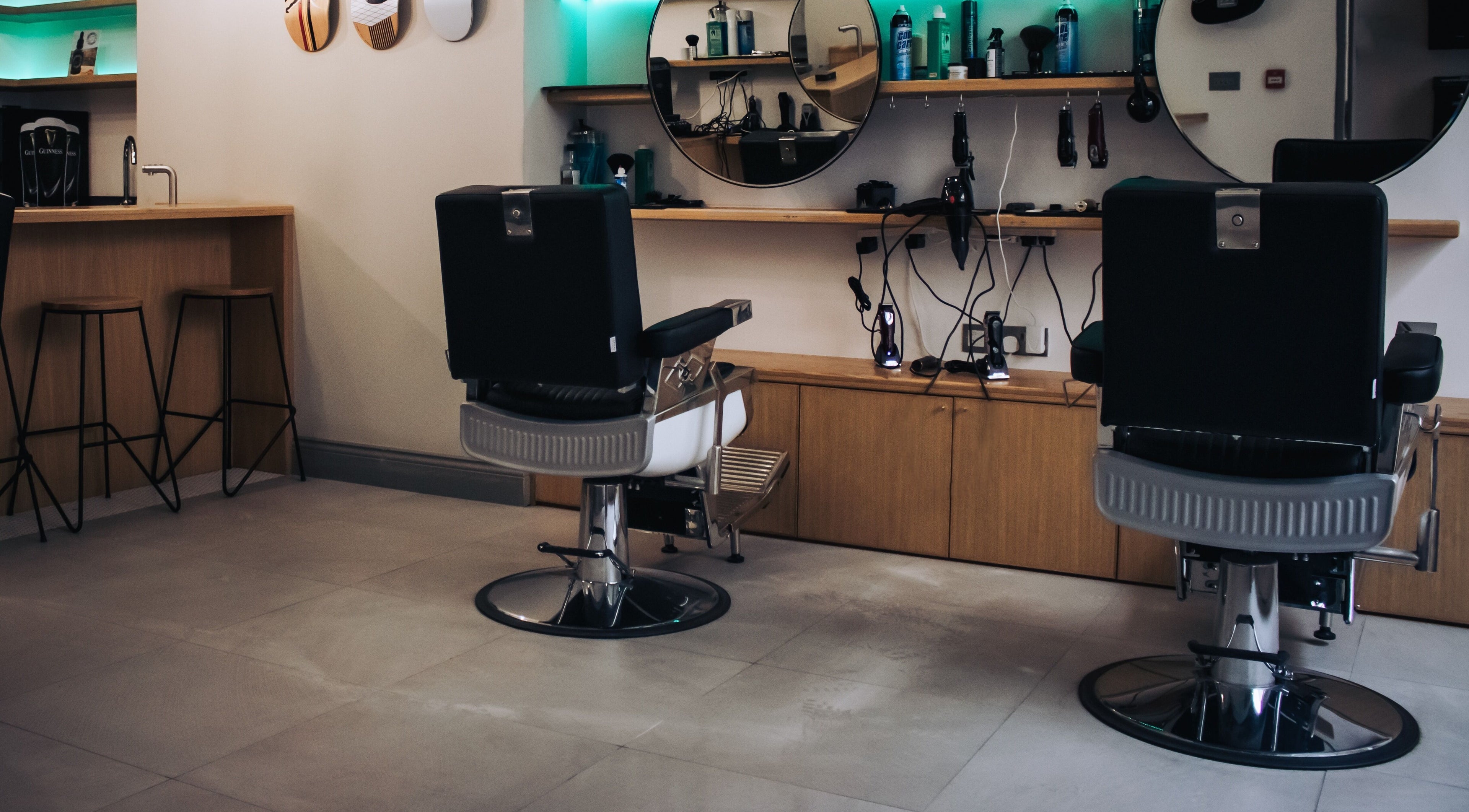 Stylish salon interior at Barvello in Saint Helier, St Helier, JE, featuring modern chairs and decor.