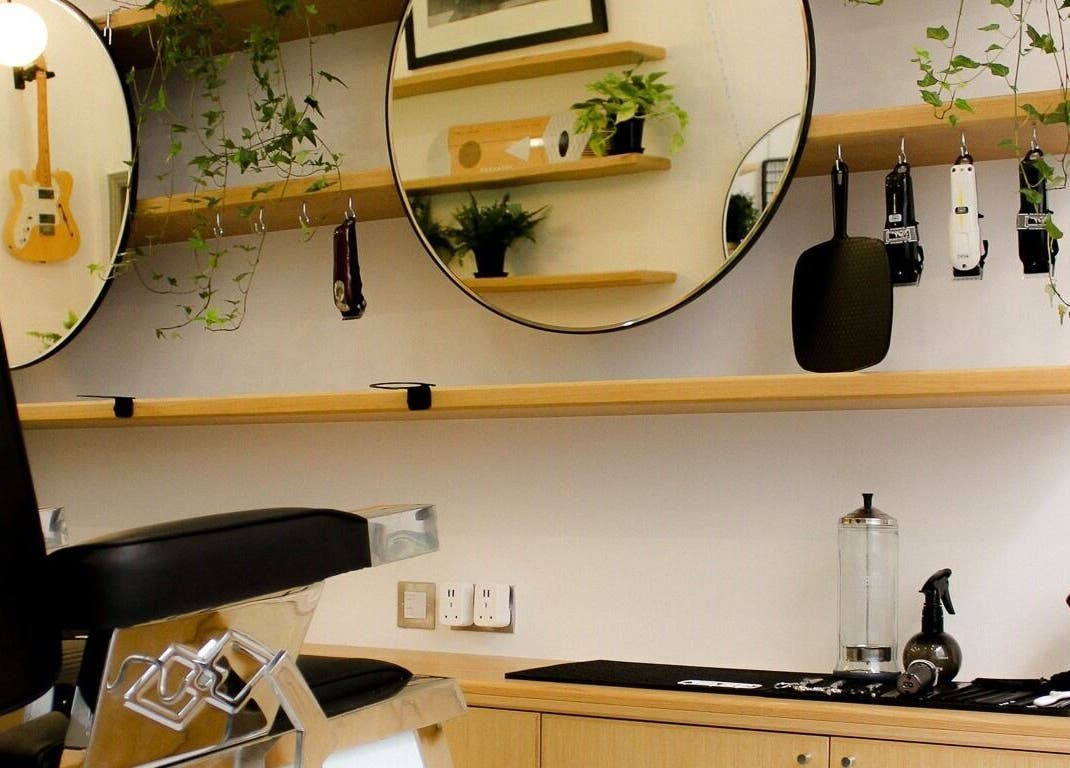 Modern barber chair and stylish decor at Barvello, Saint Helier, St Helier, JE.