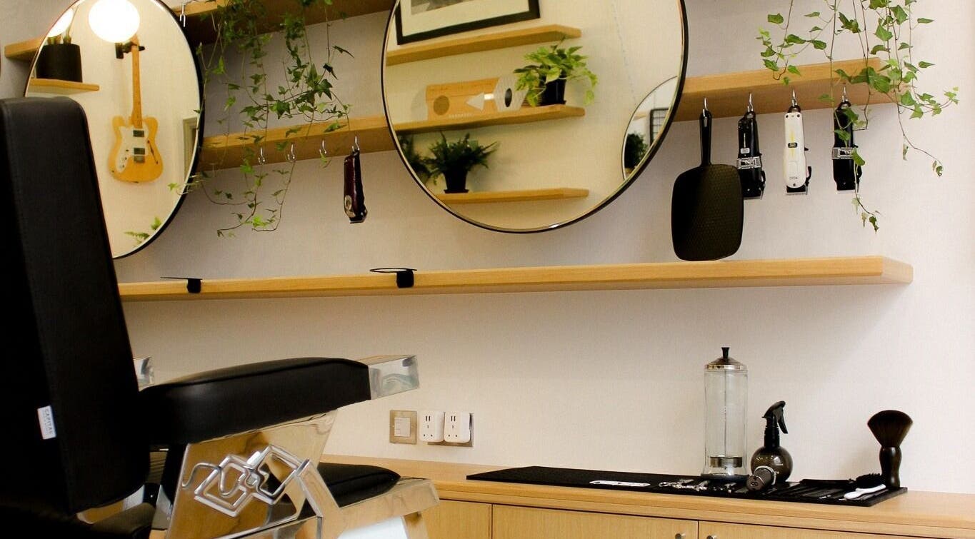 Modern barber chair and stylish decor at Barvello, Saint Helier, St Helier, JE.