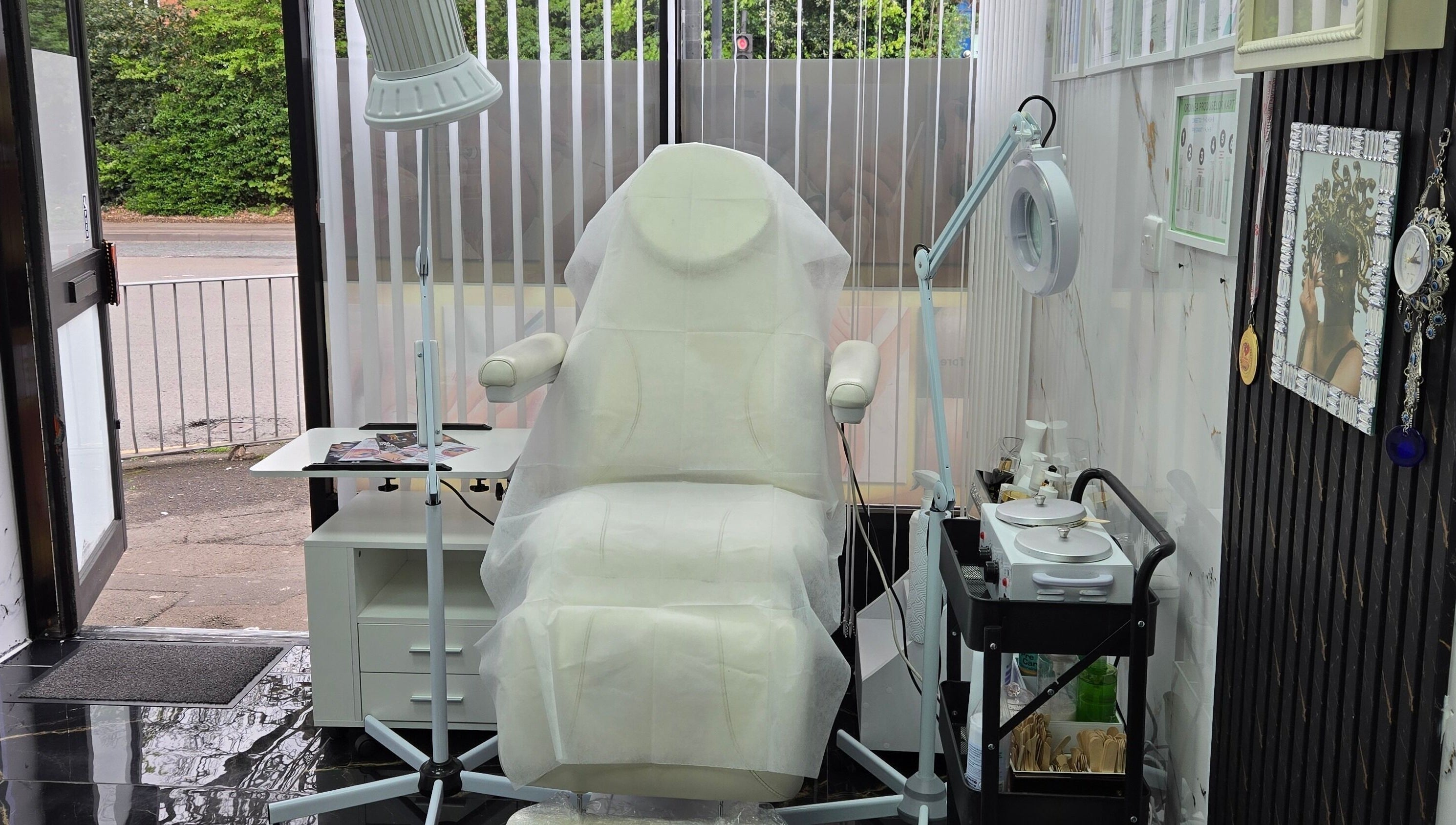 Beauty&Nails By Flory treatment room with equipment in Coventry, England, GB providing a relaxing ambiance.