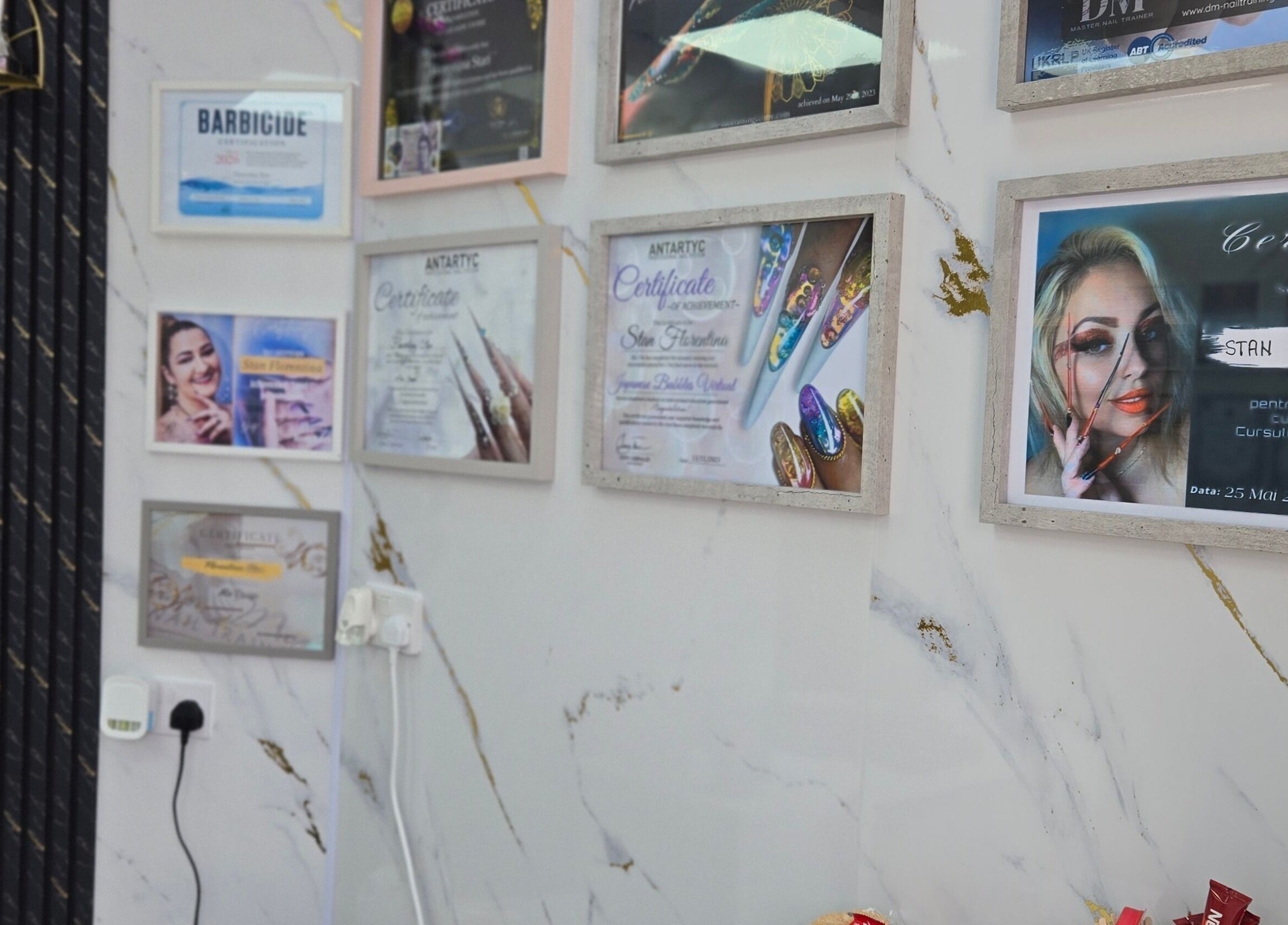 Award and certificate wall at Beauty&Nails By Flory, Coventry, England, GB showcasing achievements.