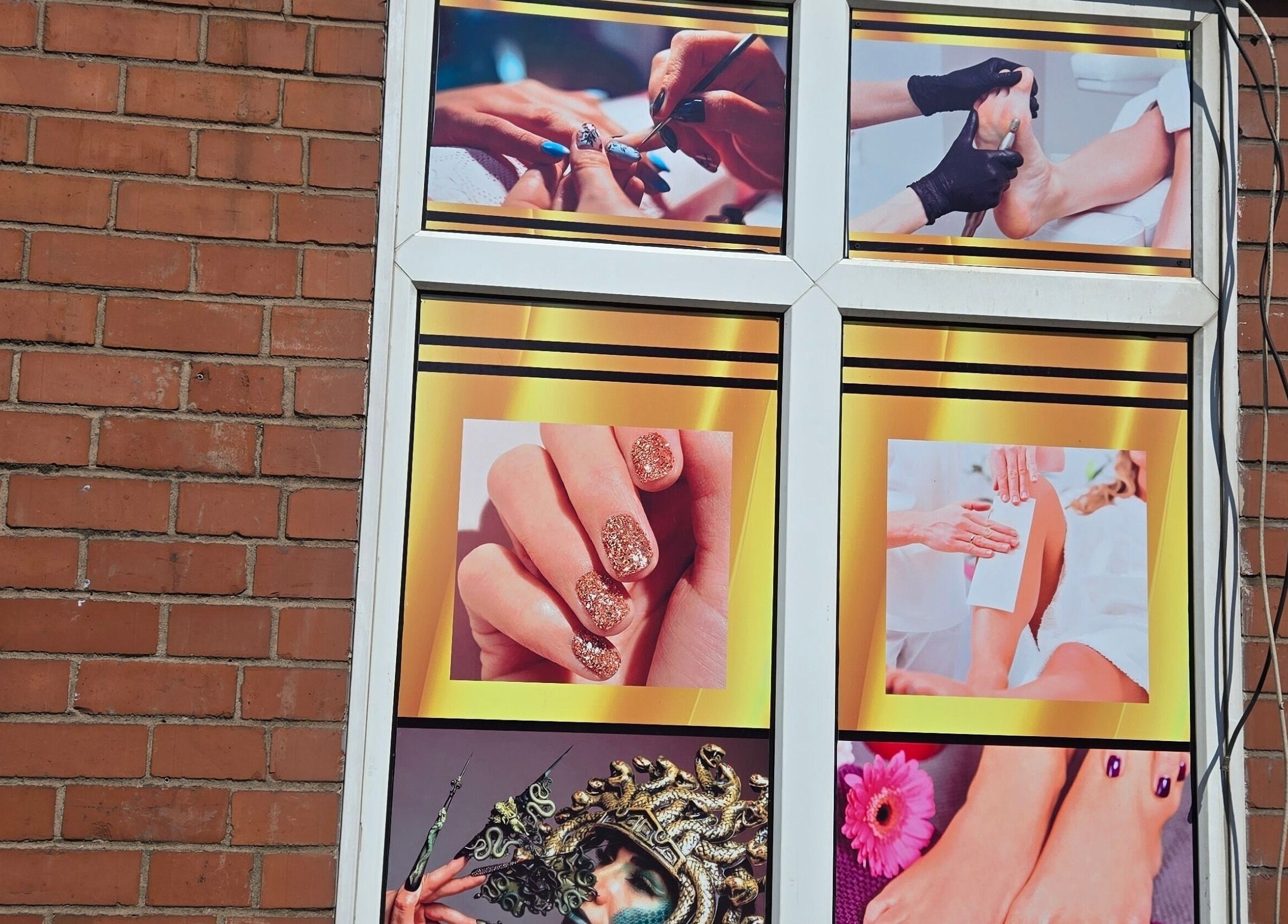 Window display at Beauty&Nails By Flory in Coventry, England, showcasing manicures and pedicures.
