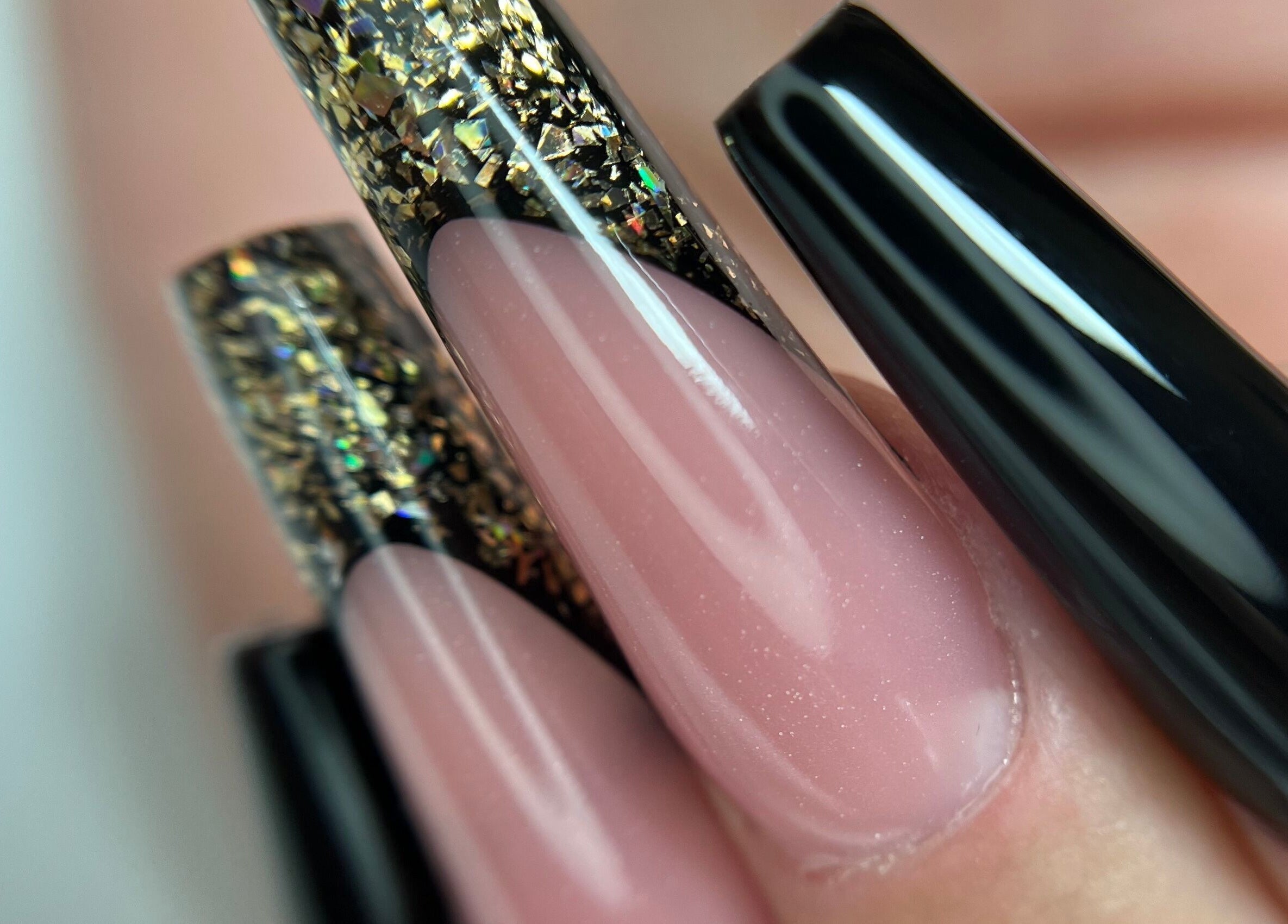 Elegant black and gold glitter nails by Beauty&Nails By Flory, Coventry, England, GB.