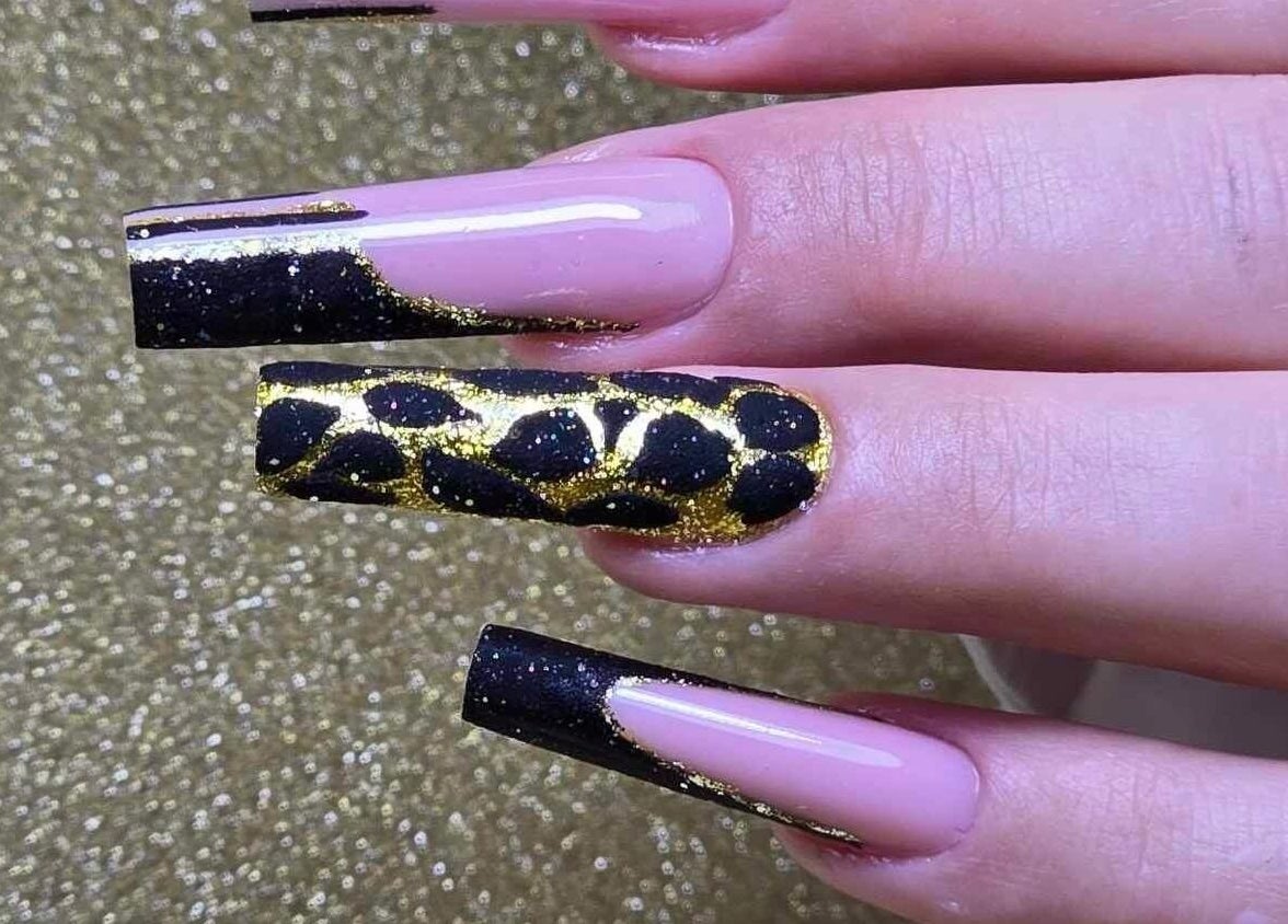 Stylish black and gold nail art at Beauty&Nails By Flory, Coventry, England, GB salon.