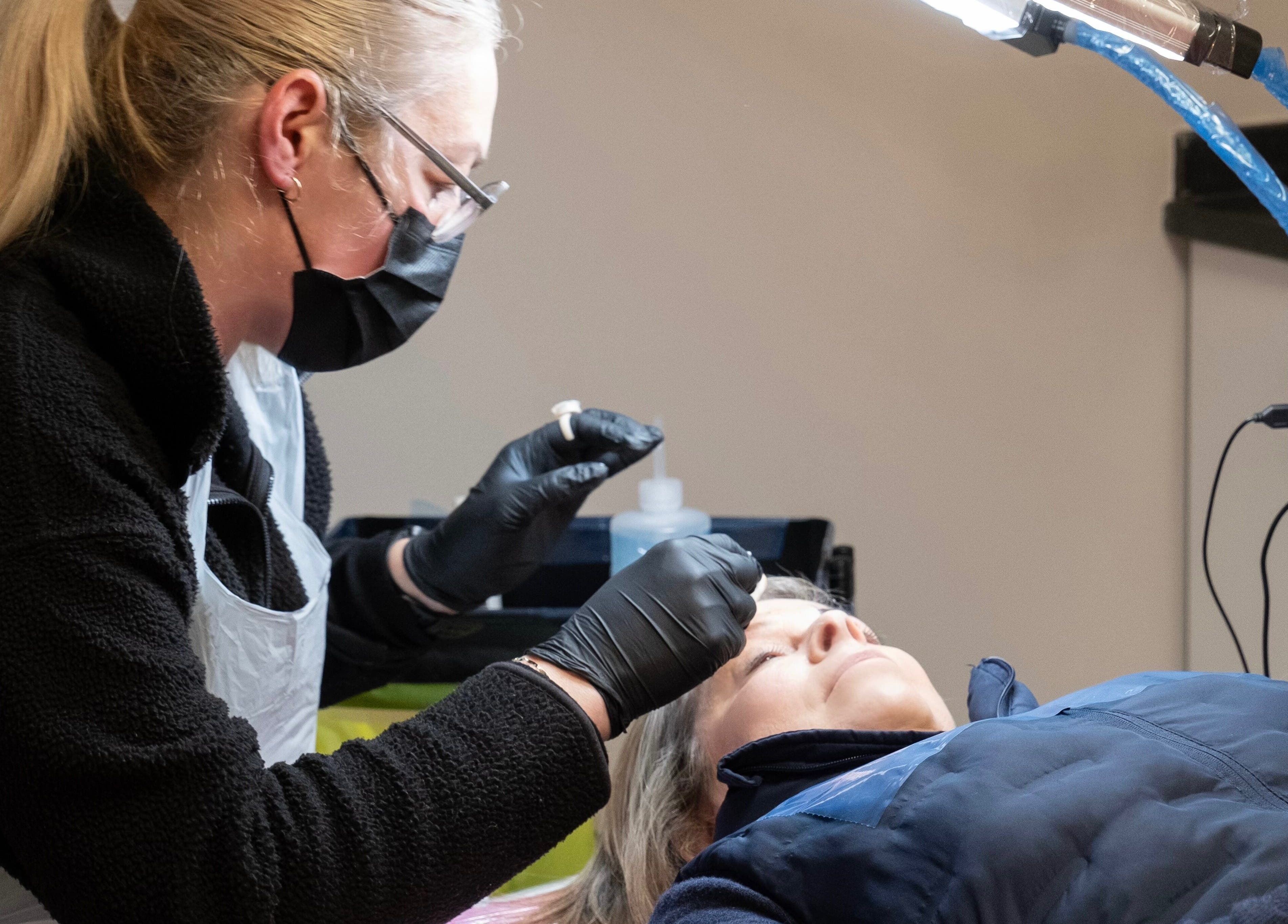 Arcus SPMU Ltd technician performing treatment in Wallsend, England, GB, ensuring client relaxation.