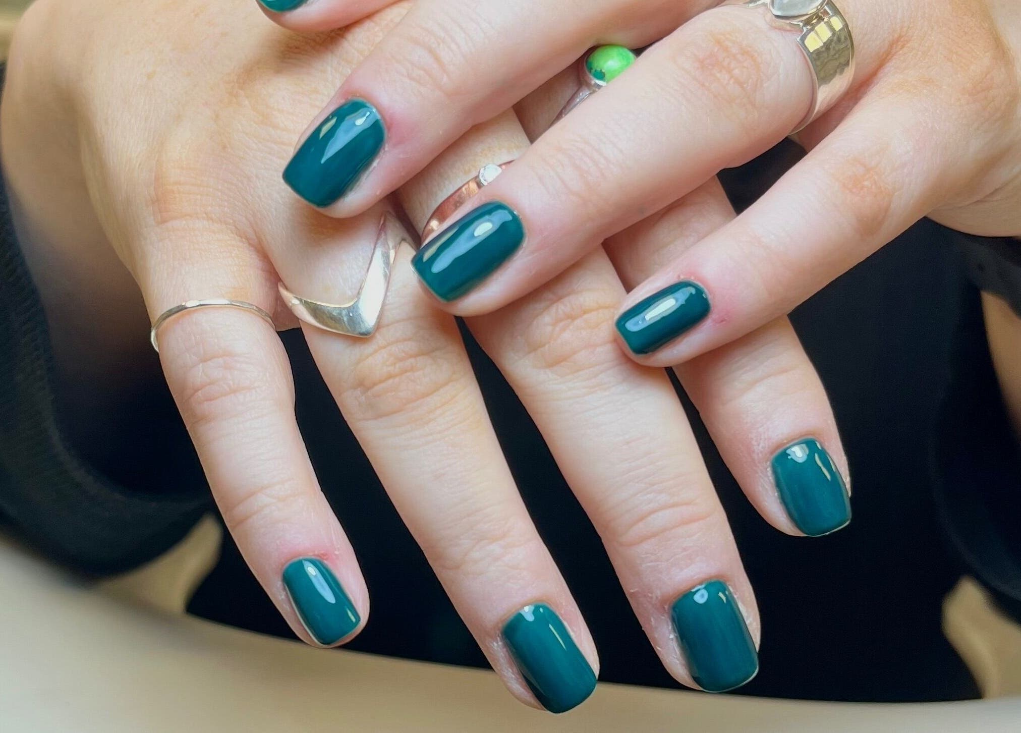 Elegant emerald nails at Perfectpedi With Frenchies, Pembroke, Cymru, GB. Impeccable manicure and style.