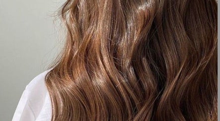Luxurious wavy brown hair styled at Glow Beauty, Elgin, Scotland, GB for a flawless, elegant look.