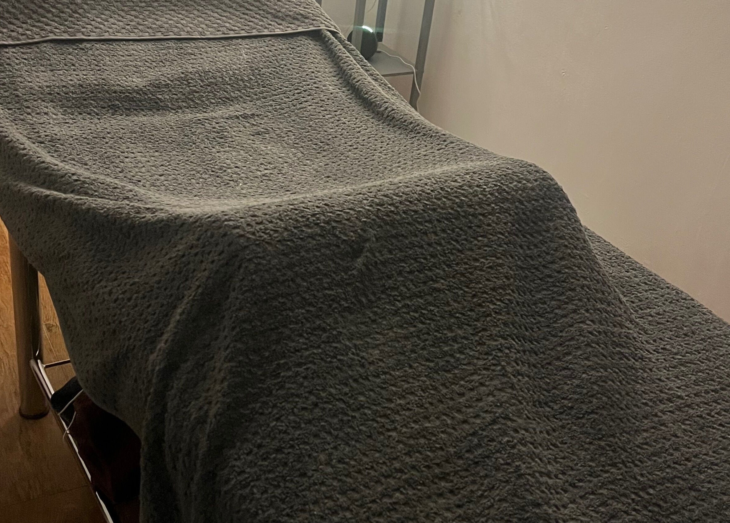 Relaxing treatment bed at Joy in Beauty, Griggs Green, England, GB, offering serene beauty experiences.