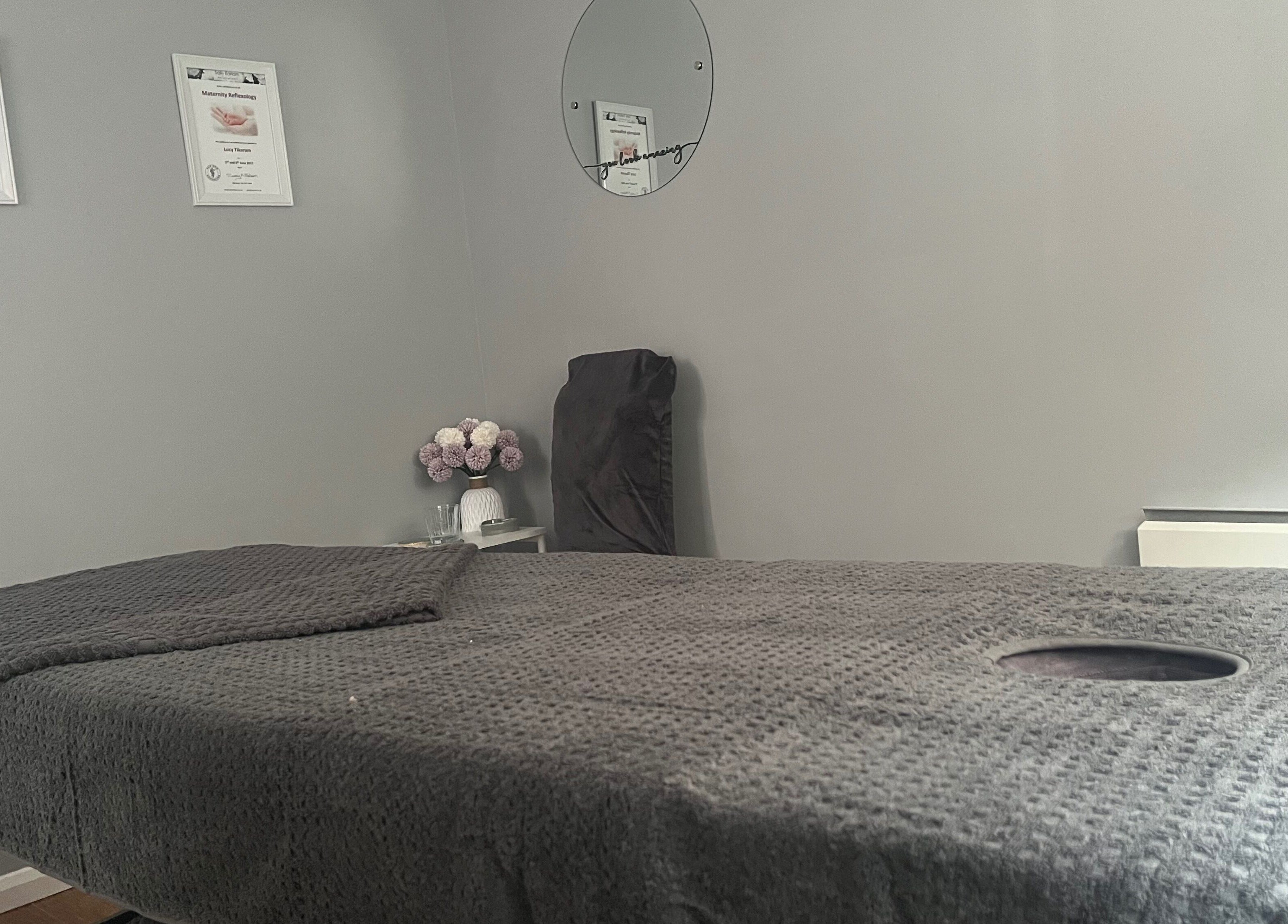 Tranquil treatment room at Joy in Beauty, Griggs Green, England, GB, featuring a plush massage table.