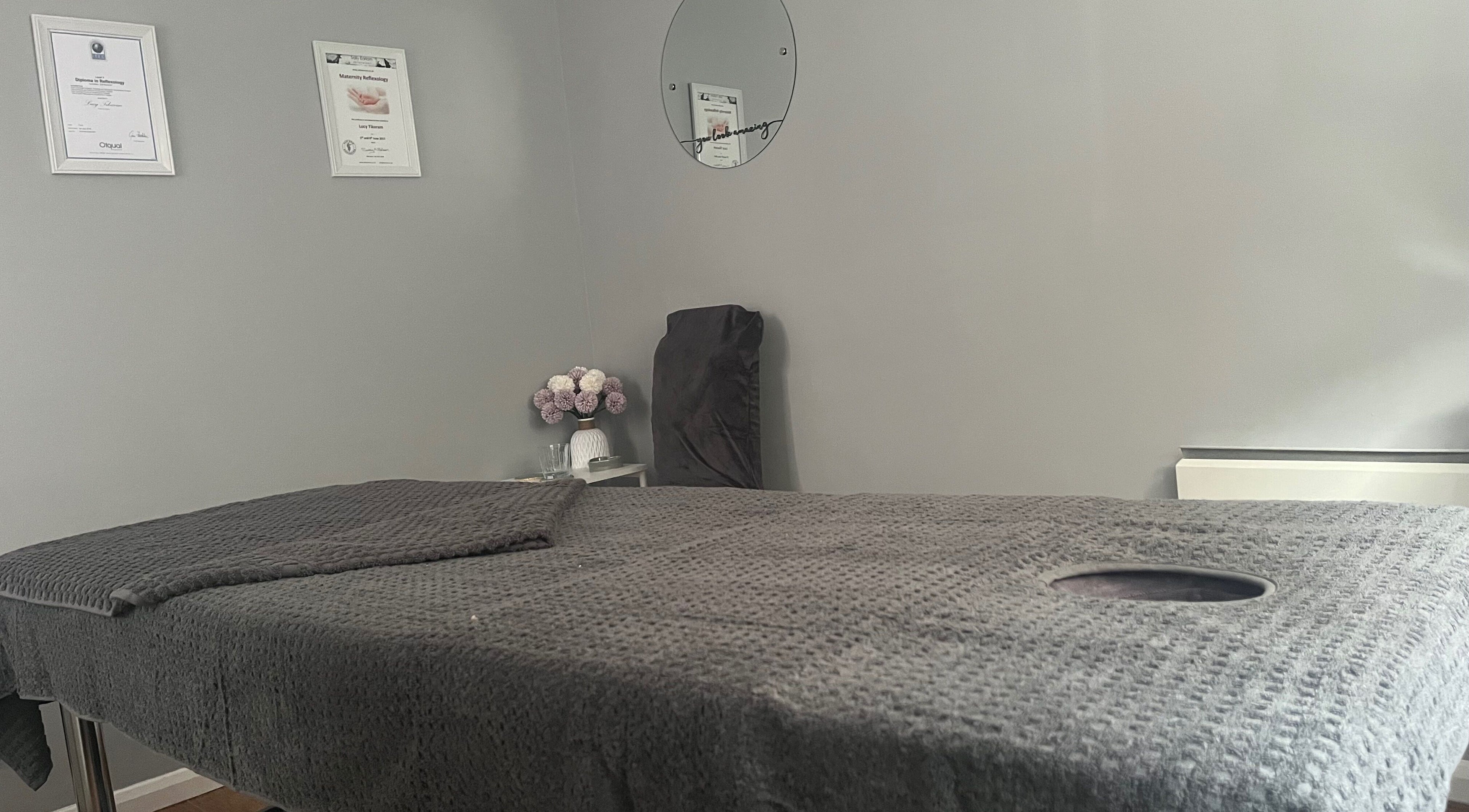 Tranquil treatment room at Joy in Beauty, Griggs Green, England, GB, featuring a plush massage table.