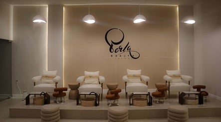 Luxurious pedicure chairs at Perla Beauty Lounge in Ras Al Khaimah, AE offer comfort and style.