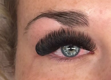 Close-up of lush eyelash extensions by Lashes By Lauren, Birmingham, England, GB, showcasing expert beauty technique.