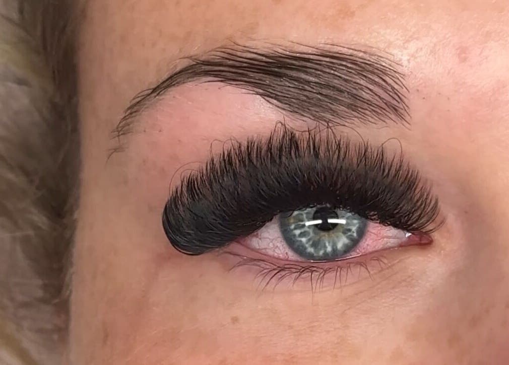 Close-up of lush eyelash extensions by Lashes By Lauren, Birmingham, England, GB, showcasing expert beauty technique.