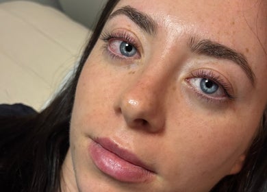 Close-up of woman's lashes at Lashes By Lauren in Birmingham, England, GB showcasing expert beauty treatment.