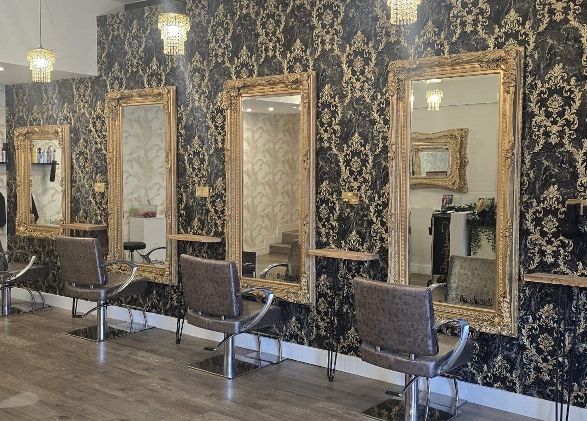 Chic salon interior at Freedom Beauty Co by Helen Isaacson in Houghton Le Spring, England, GB, featuring ornate mirrors.