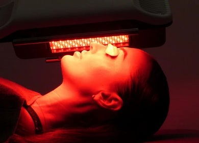 LED light therapy at William Foley Skin in Alderley Edge, England, GB, showing a client under red light treatment.