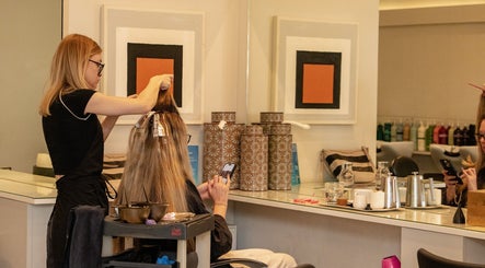 Stylist at David Masters Salon - St Margarets, Twickenham enhancing client's hair with foils.