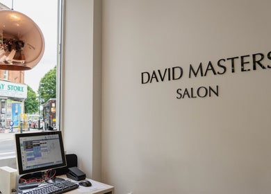 Reception area of David Masters Salon - St Margarets, Twickenham, England, with modern decor and street view.
