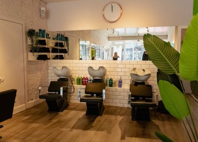 David Masters Salon - Richmond Bridge, features sleek styling chairs and modern wash stations in Twickenham, England, GB.